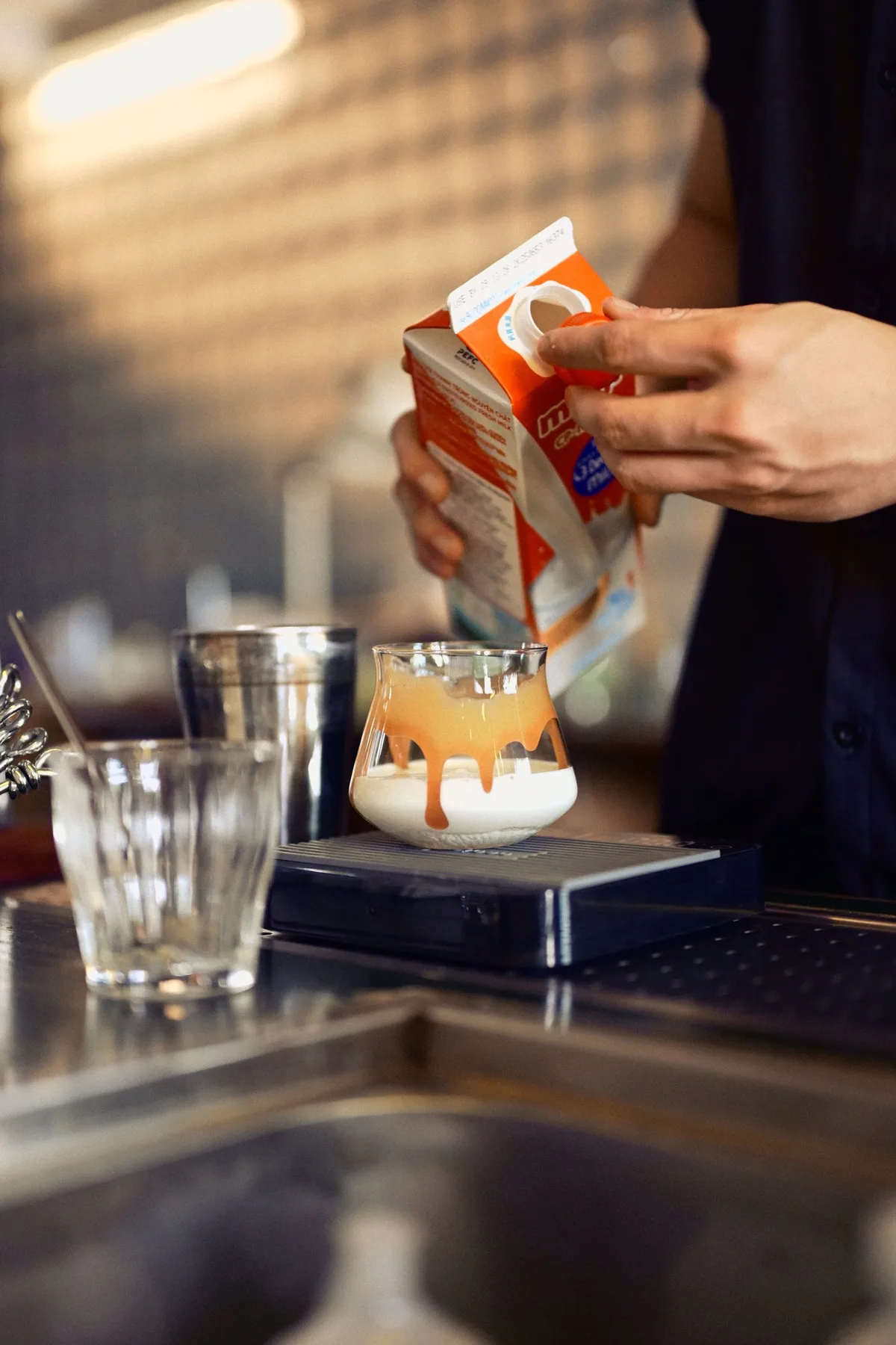 Creamy iced coffee being prepared