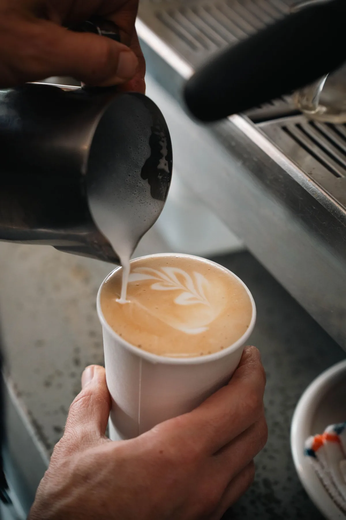 Latte art in a warm café atmosphere